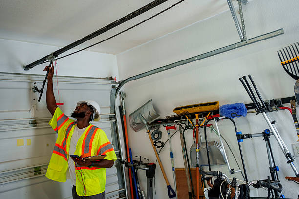 Professional Garage Door Panel Replacement technician working in Dobson, NC